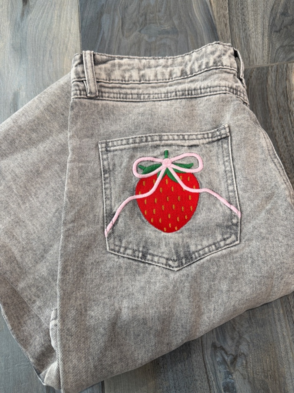 Gray washed wide leg Jeans with Strawberry Back Pocket Appliqués